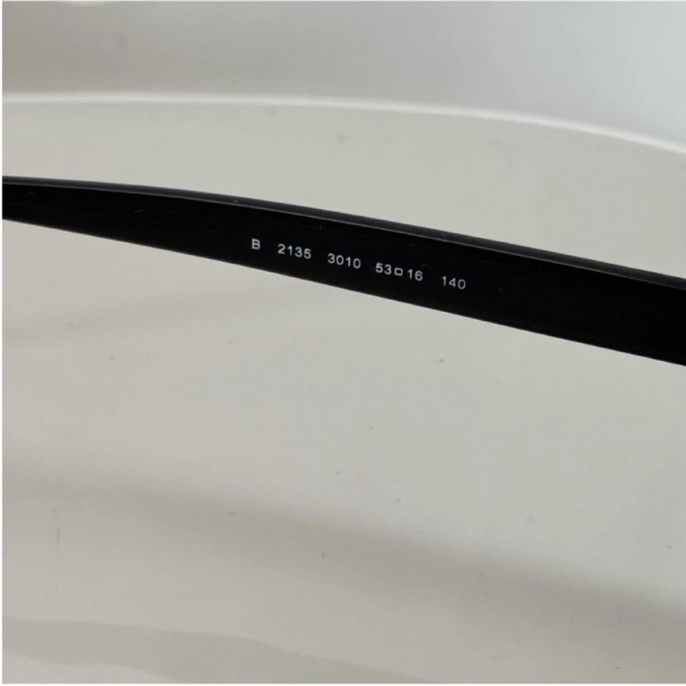 Burberry Elegant Black and Brown Glasses